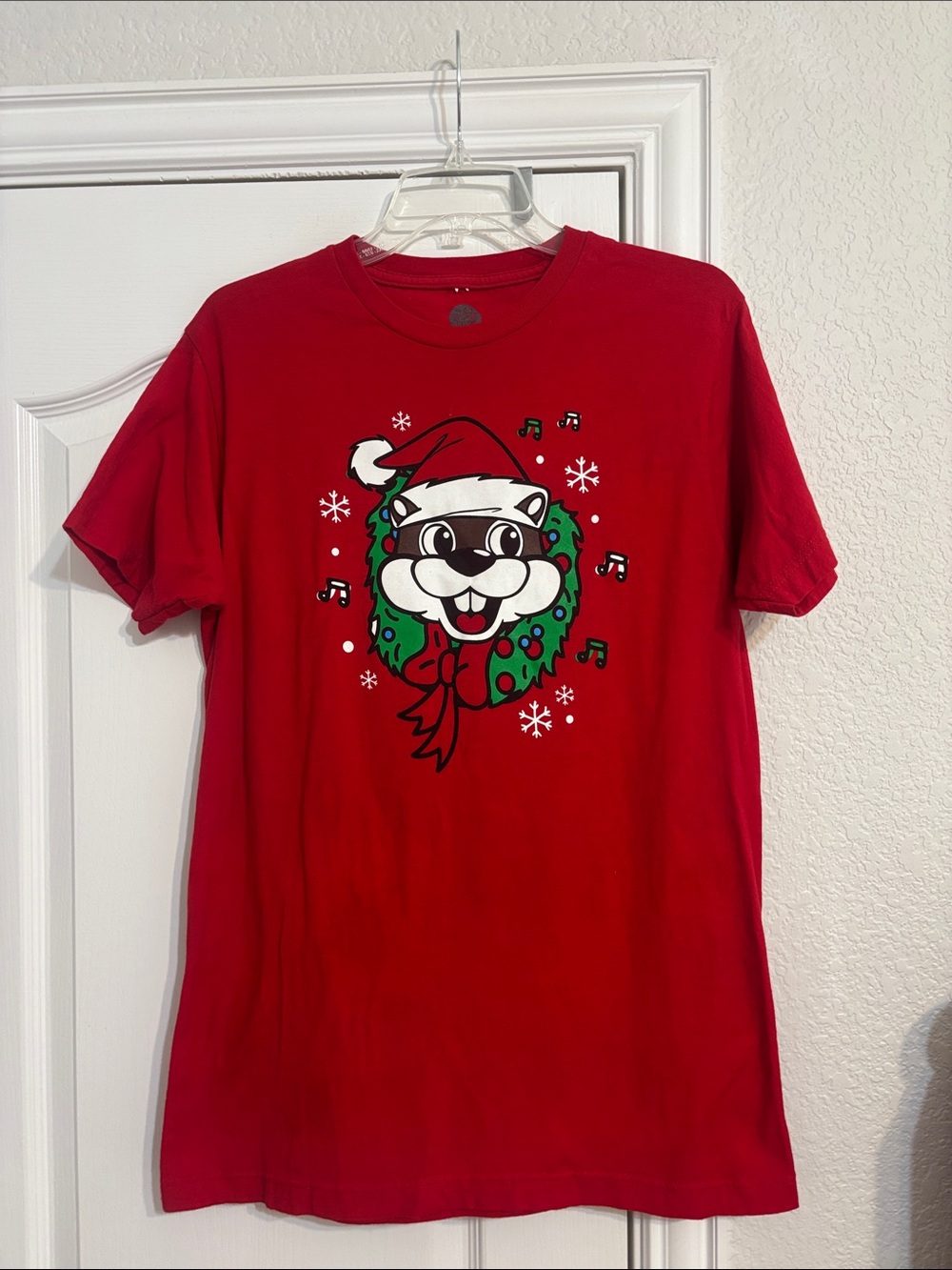 Adult size medium Bucee’s Red Holiday Graphic Tee
